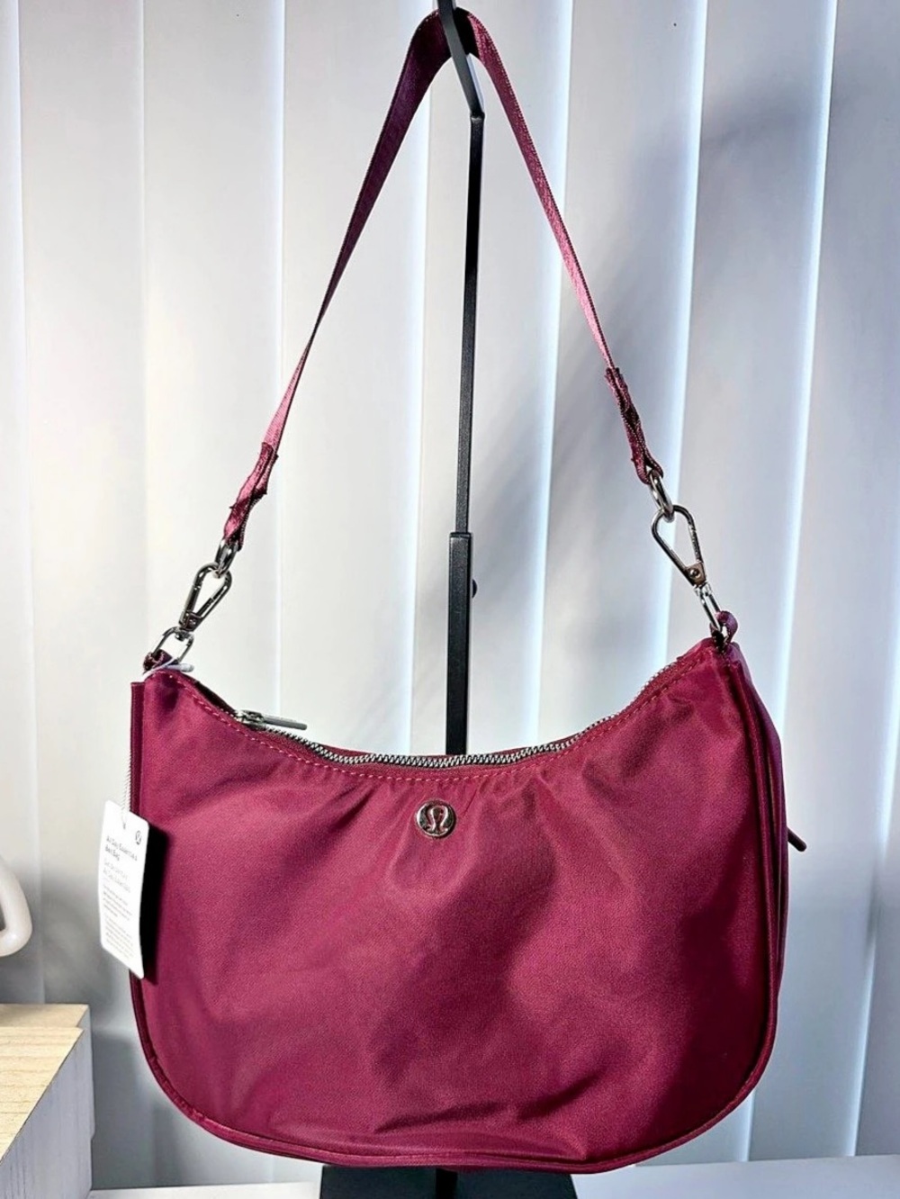 lululemon City Essentials Shoulder Bag in burgundy.